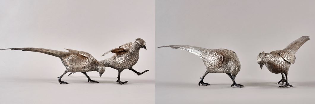 Couple of pheasants in chiseled silver